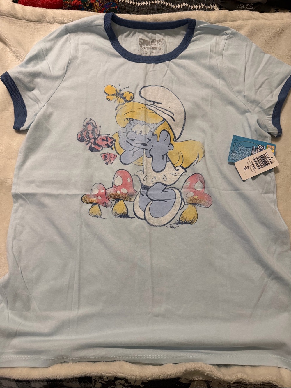 9 total 7 with tags
torrid Light Blue Smurfette, rainbowbright exc Graphic  Tees